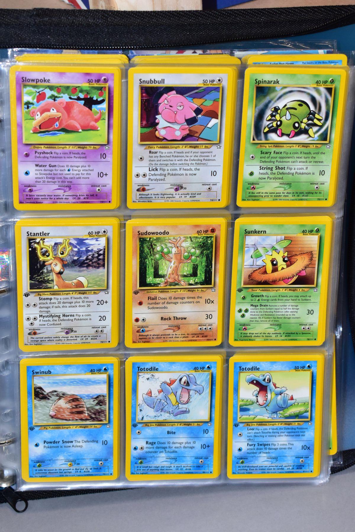 A BLUE POKEMON FOLDER CONTAINING AN ALMOST COMPLETE NEO GENESIS SET, which includes first - Bild 10 aus 33