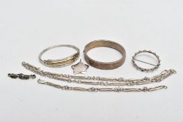 SIX ITEMS OF SILVER AND WHITE METAL JEWELLERY, to include a hinged bangle part engraved with