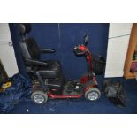 A EASYLIVING MOBILITY COLT SPORT MOBILITY SCOOTER with two chargers, one key and cover (PAT pass and