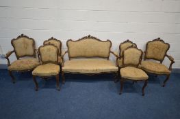 A LOUIS XV STYLE MAHOGANY SEVEN PIECE SALON SUITE, comprising a sofa with open armrests, pair of