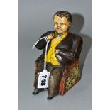 A CAST IRON TAMMANY BANK MONEY BOX/BANK, modelled as the seated figure of possibly 19th Century U.