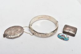 A SILVER BANGLE, LOCKET, PILL BOX, AND A GUILLOCHE ENAMEL BROOCH, the hinged bangle decorated with