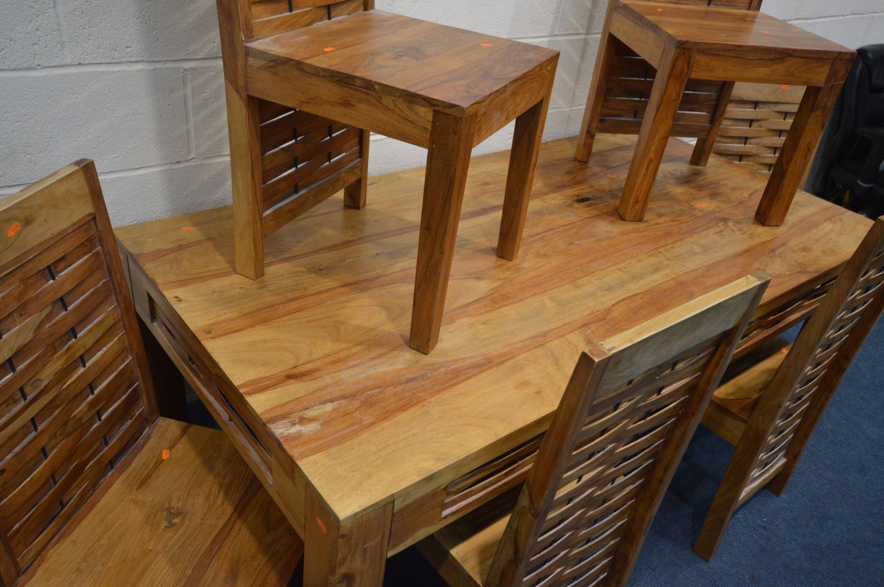 A MANGO WOOD DINING TABLE with weaving to each frieze, on block legs and a set of six matching - Image 2 of 3