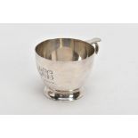 A SILVER TEA CUP, of a plain polished design, engraved initials 'AJEG, October 31st 1928', small