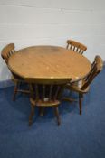 A PINE CIRCULAR PEDESTAL DINING TABLE, diameter 114cm x height 73cm and four chairs (condition -