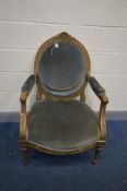 A LOUIS XVI STYLE, oval back with open armrests, on tapered fluted legs, width 67cm x depth 74cm x