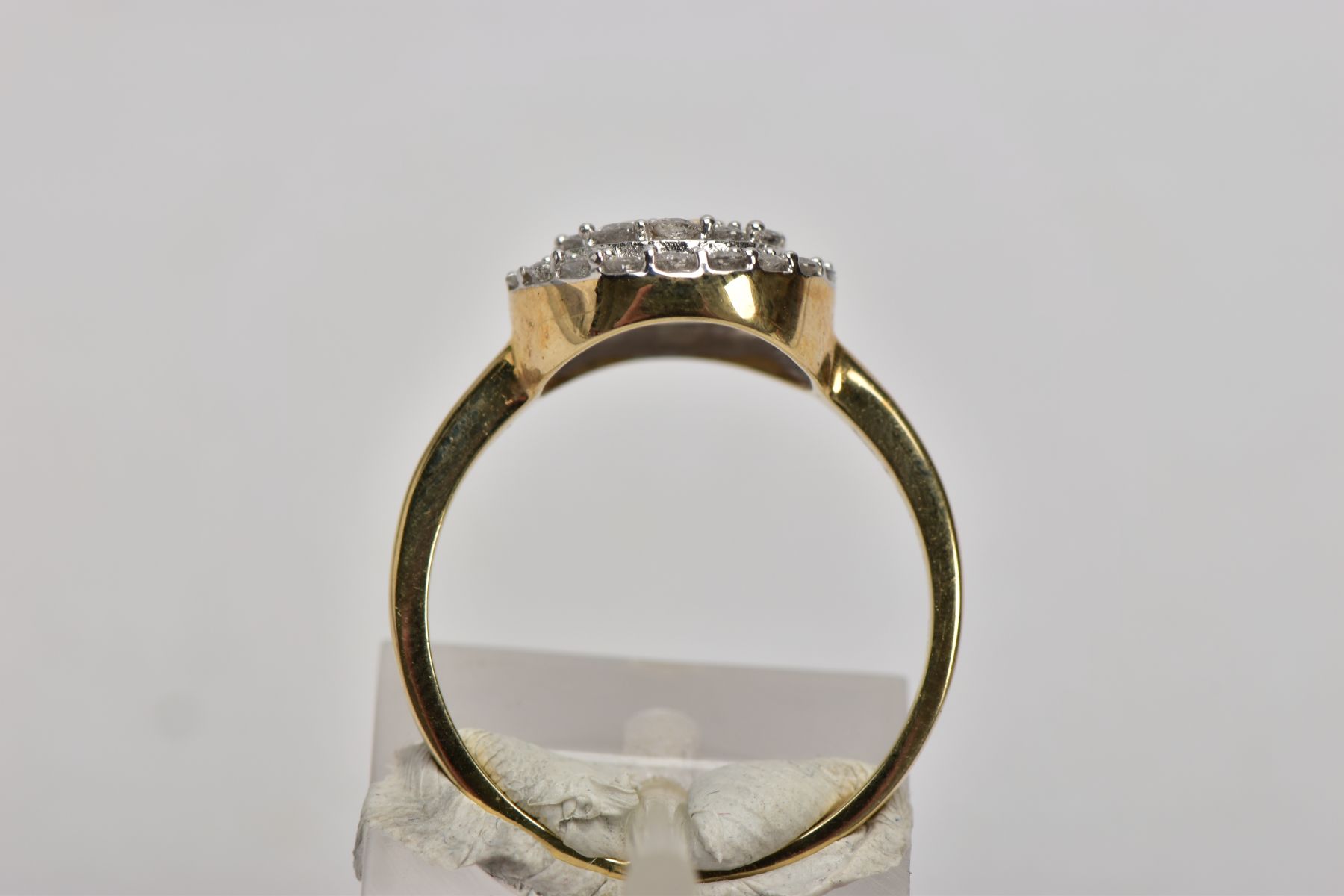 A 9CT GOLD DIAMOND CLUSTER RING, of a circular design, the central part set with four princess cut - Image 3 of 5