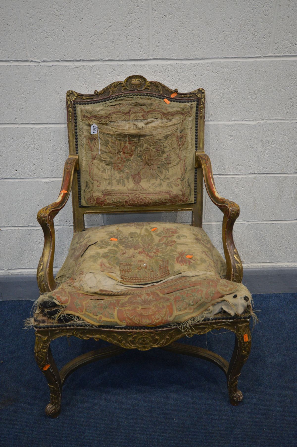 A LOUIS XVI STYLE OPEN GILTWOOD OPEN ARMCHAIR, square back, shaped legs united by a cross stretcher,