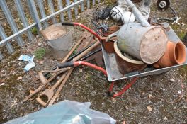 SEVEN GLAZED PLANT POTS, a strawberry pot , a wheel barrow, a galvanised watering can and bucket