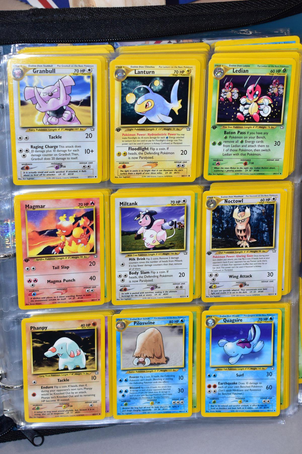 A BLUE POKEMON FOLDER CONTAINING AN ALMOST COMPLETE NEO GENESIS SET, which includes first - Bild 6 aus 33