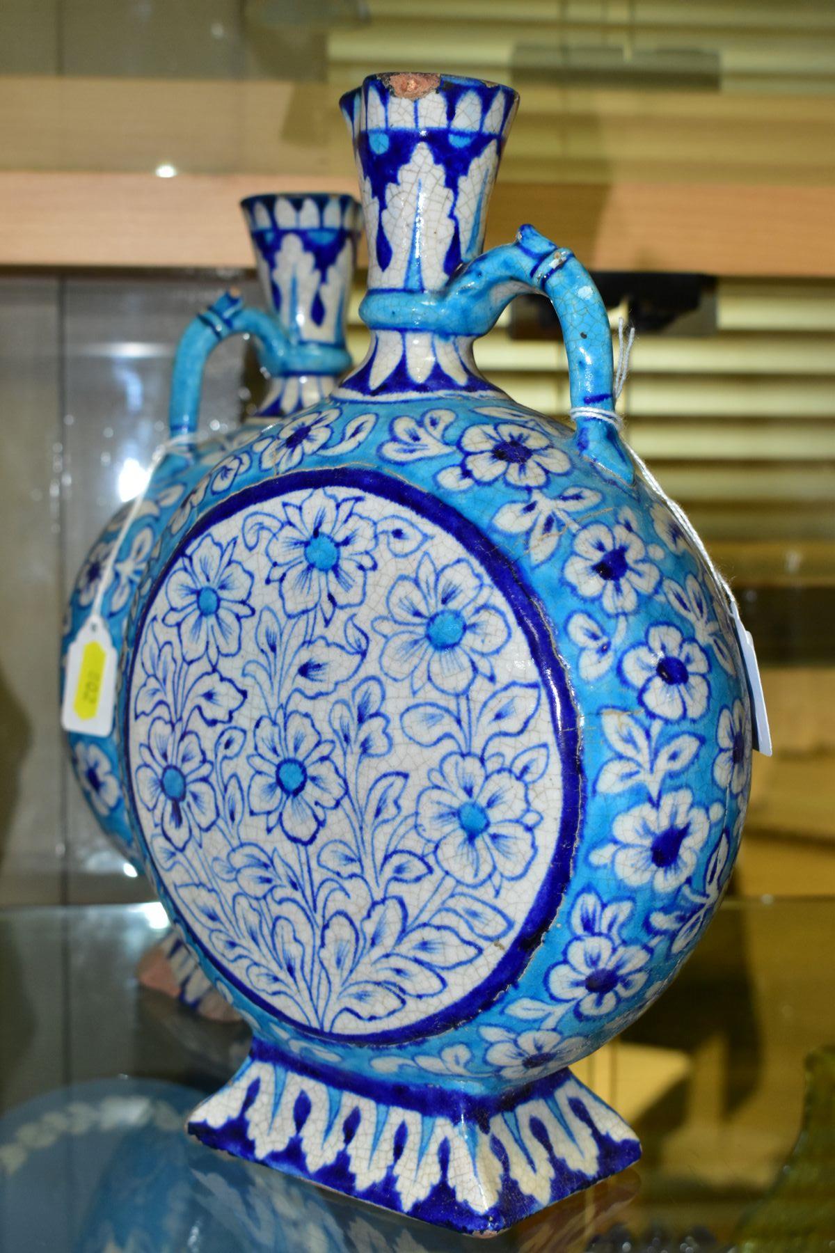 A PAIR OF LATE 19TH/EARLY 20TH CENTURY IZNIK STYLE EWERS, of moon flask form, the turquoise and blue - Image 3 of 8