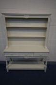 A CREAM PAINTED MAHOGANY DRESSER, with three drawers, width 138cm x depth 45cm x height 183cm x