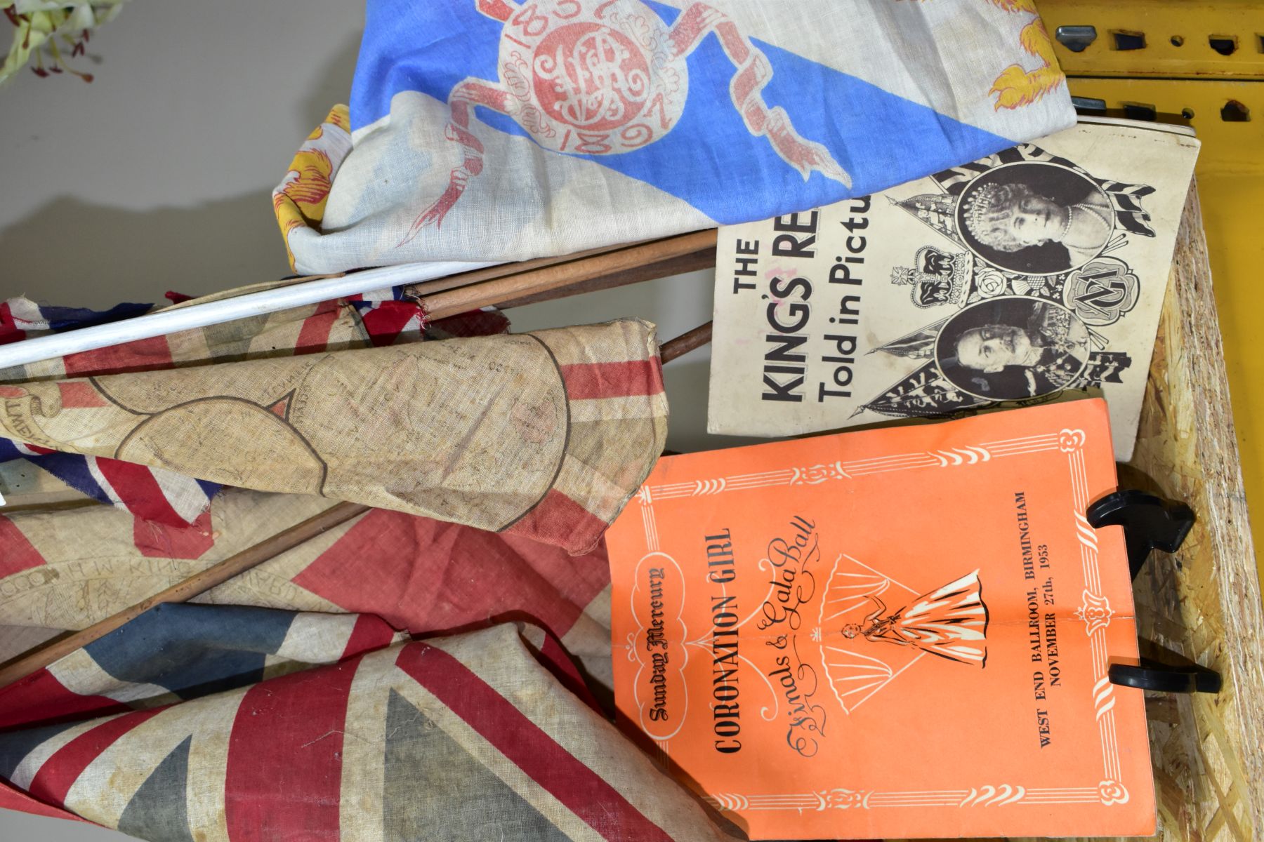 SEVEN VINTAGE FLAGS AND TWO BOOKLETS, to include 'The King's Reign Told in Pictures' (King George