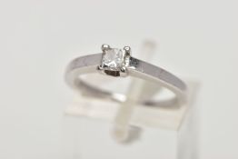 AN 18CT WHITE GOLD SINGLE STONE DIAMOND RING, the princess cut diamond within a four claw setting to