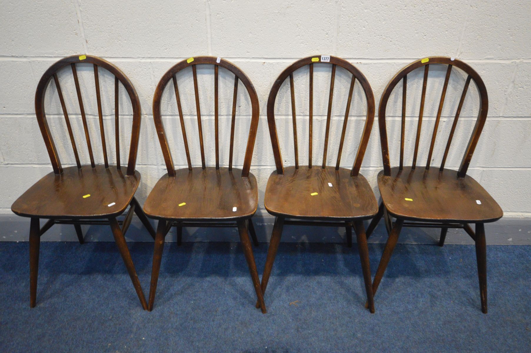 A SET OF FOUR ERCOL ELM AND BEECH MODEL 400 KITCHEN CHAIRS
