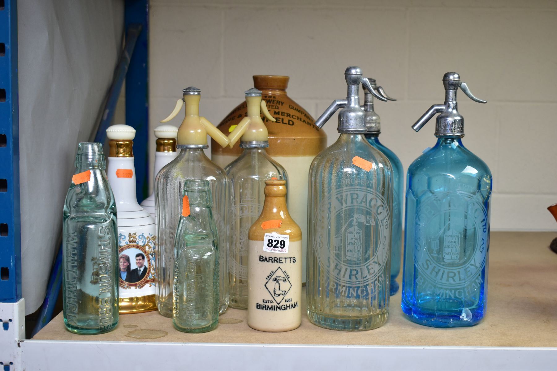A GROUP OF ELEVEN BOTTLES, GLASS SODA SYPHONS etc, to include Codd bottles, intact with marbles,