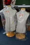 TWO CHILD SIZE HALF LENGTH MANNEQUINS, fabric covered torsos mounted on wooden swivel bases, heights