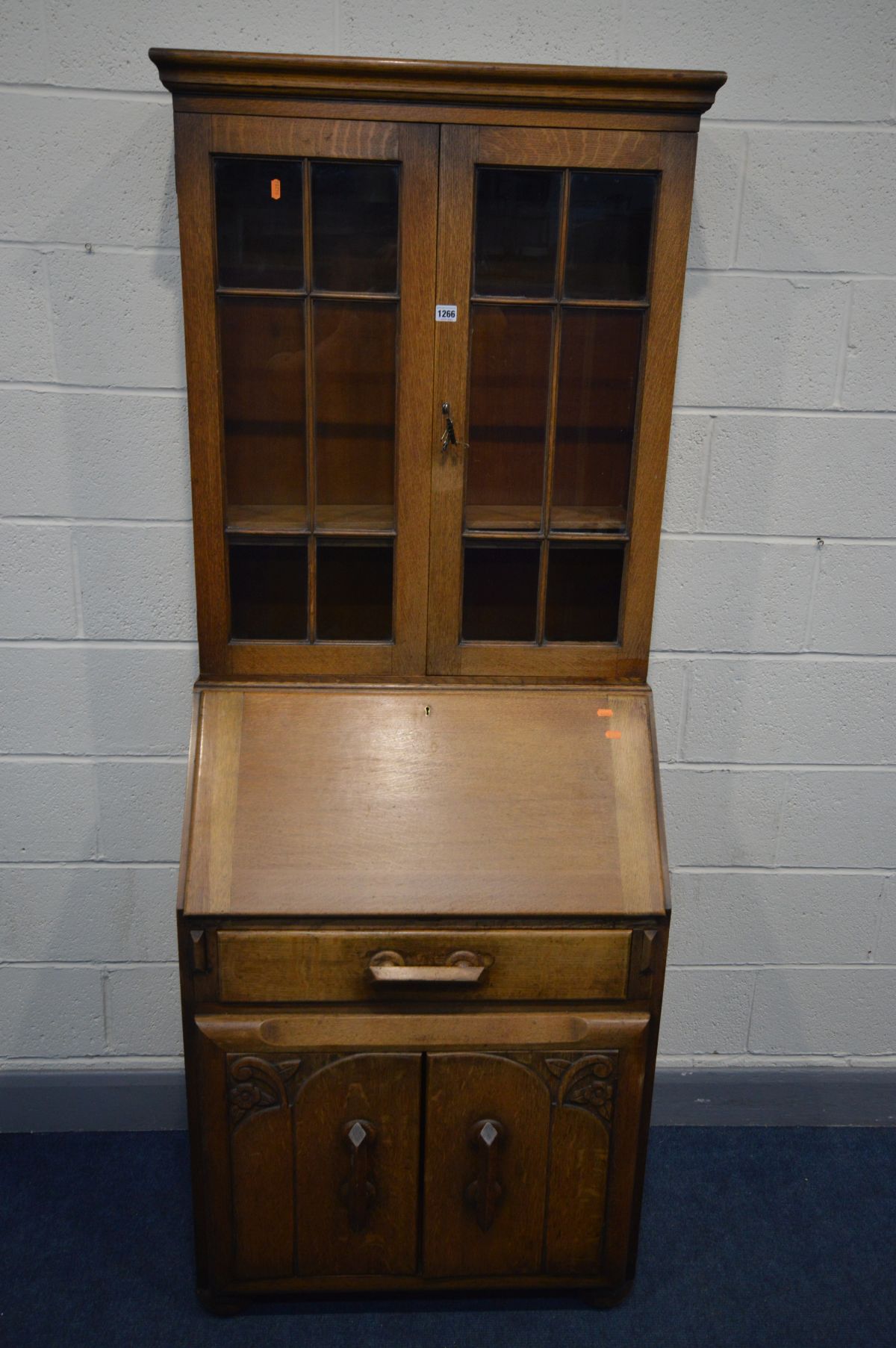 A 1940'S OAK BUREAU BOOKCASE, width 76cm x depth 50cm x height 199cm (key)