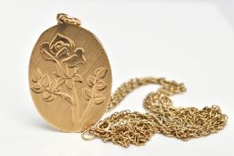 A 9CT GOLD PENDANT AND CHAIN, the oval pendant with large hallmark stamped vertically to one side