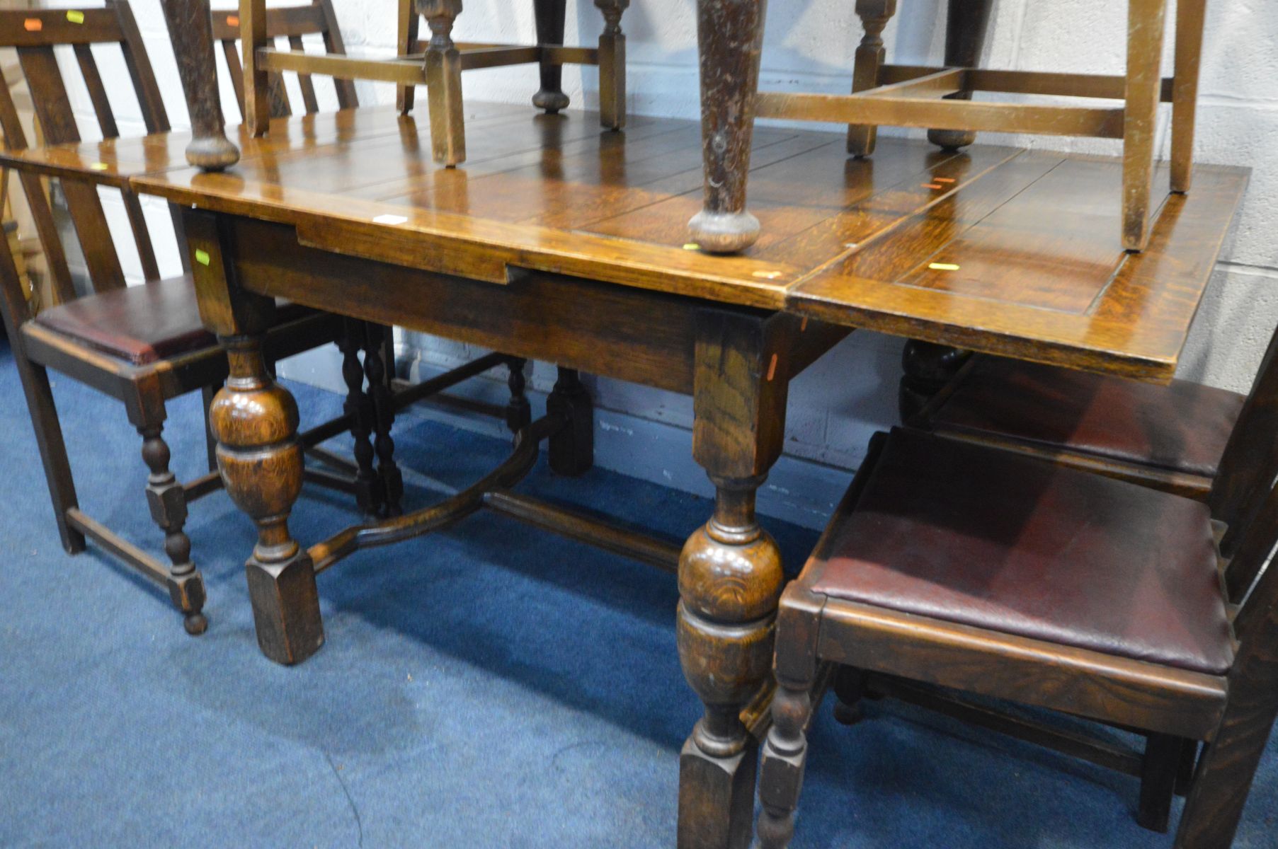 AN EARLY TO MID 20TH CENTURY OAK DRAW LEAF TABLE, on bulbous legs united by stretchers, open - Image 2 of 2