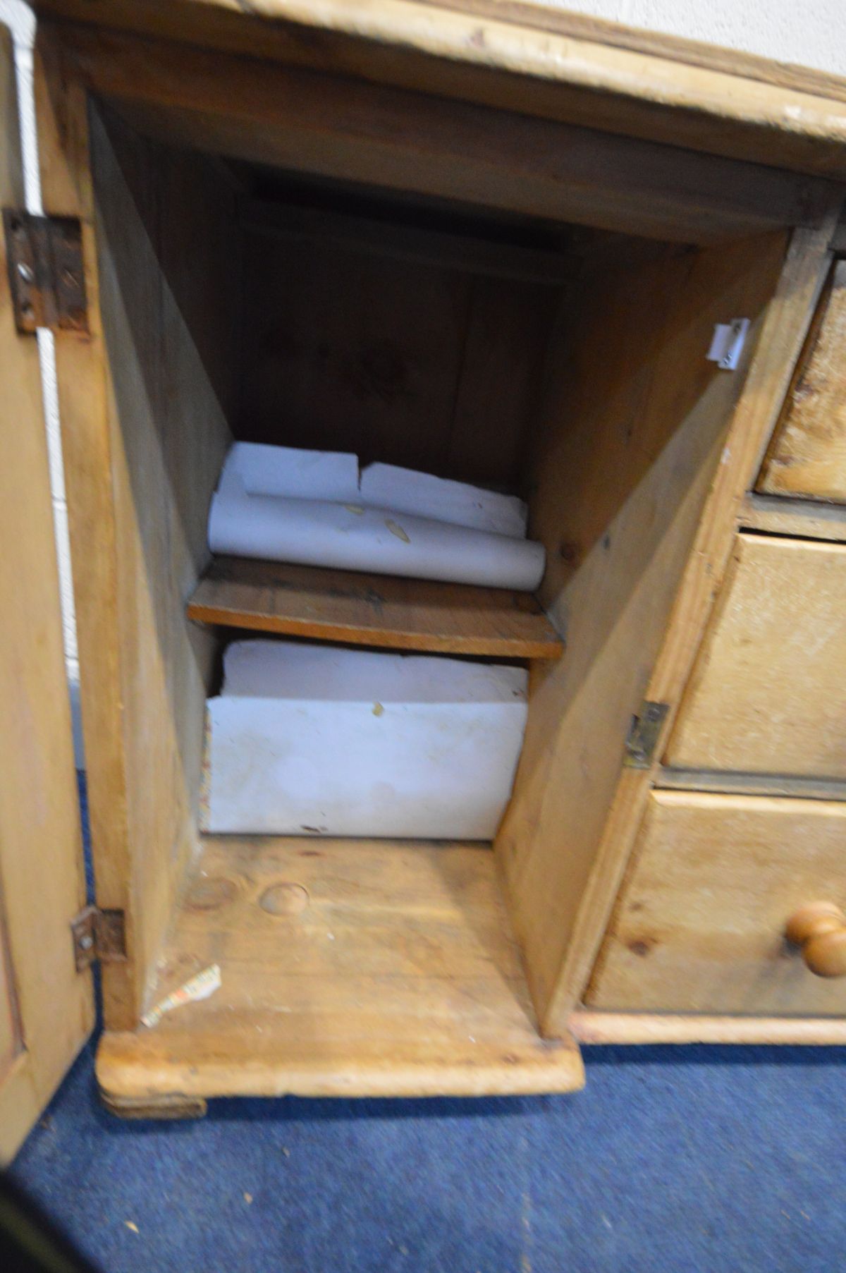 A VICTORIAN PINE SIDEBOARD, with three graduated drawers besides a single panelled cupboard door, on - Image 3 of 4