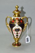 A ROYAL CROWN DERBY TWIN HANDLED LIDDED URN, with painted and printed red marks, marked 128 and