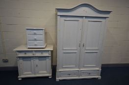 A PINE PANELLED TWO DOOR ARMOIRE, later painted white, above two drawers, width 140cm x depth 67cm x