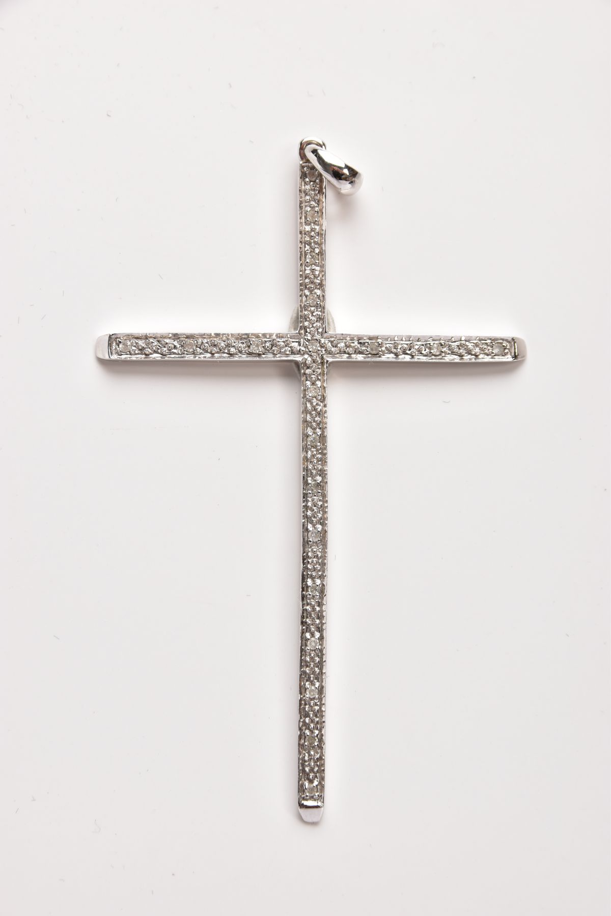 A 9CT GOLD DIAMOND CROSS PENDANT, a large cross pendant set with single cut diamond detail, fitted