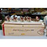 A BOXED STEIFF LIMITED EDITION CHRISTMAS EXPRESS 2006, No. 128/750, comprising Santa teddy seated in