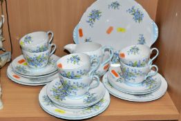 TWENTY ONE PIECES OF SHELLEY FORGET-ME-NOT PATTERNED (2394) BONE CHINA TEAWARES, comprising milk