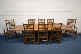 A GOOD REPRODUCTION OAK DRAW LEAF REFECTORY TABLE, on turned legs united by a single stretcher,