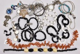 A BAG OF ASSORTED COSTUME JEWELLERY, to include an orange quartz dogtooth beaded necklace fitted