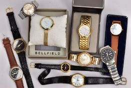 A BOX OF ASSORTED LADIES AND GENTS FASHION WRISTWATCHES, to include a ladies boxed 'Bellfield'