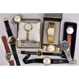 A BOX OF ASSORTED LADIES AND GENTS FASHION WRISTWATCHES, to include a ladies boxed 'Bellfield'