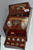 A VICTORIAN MAHOGANY CASED APOTHECARY'S BOX OF RECTANGULAR FORM, the two sliding lids fitted with