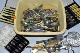 A TRAY OF ASSORTED WHITE METAL CUTLERY, to include a cased set of six EP teaspoons, a cased set of