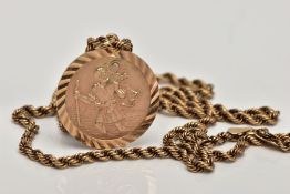 A 9CT GOLD ST. CHRISTOPHER PENDANT NECKLACE, the pendant of a circular form, hallmarked 9ct gold