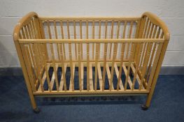 A COSATTO BEECH COT, length 126cm x depth 63cm