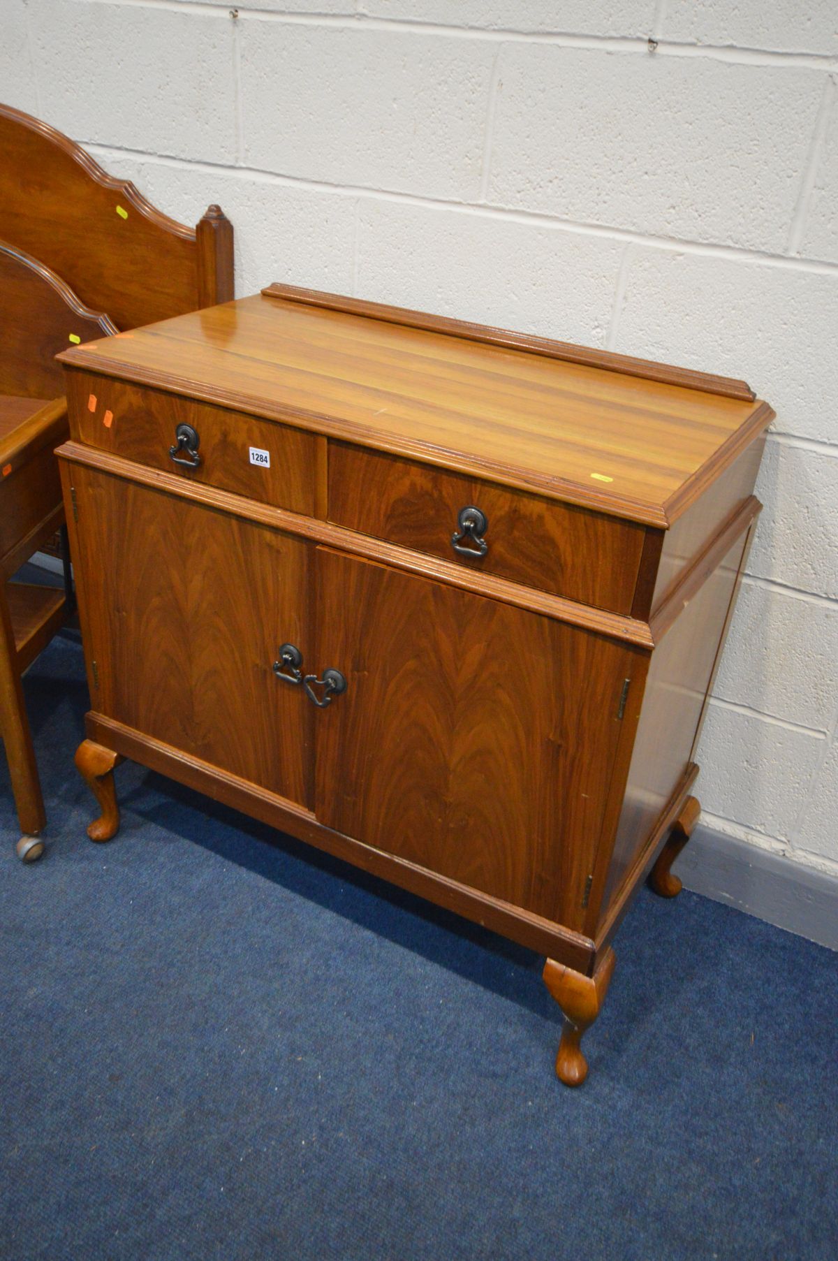 A WALNUT TWO DOOR CABINET, with two drawers, width 91cm x depth 47cm x height 91cm, along with a - Image 2 of 2