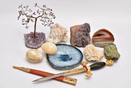 A BOX OF ROUGH AND CARVED GEMSTONES, to include a dyed blue quartz ashtray, an amethyst wire tree, a