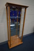 A MODERN BEECH DISPLAY CABINET, with four shelves and mirrored back, width 75cm x depth 40cm x