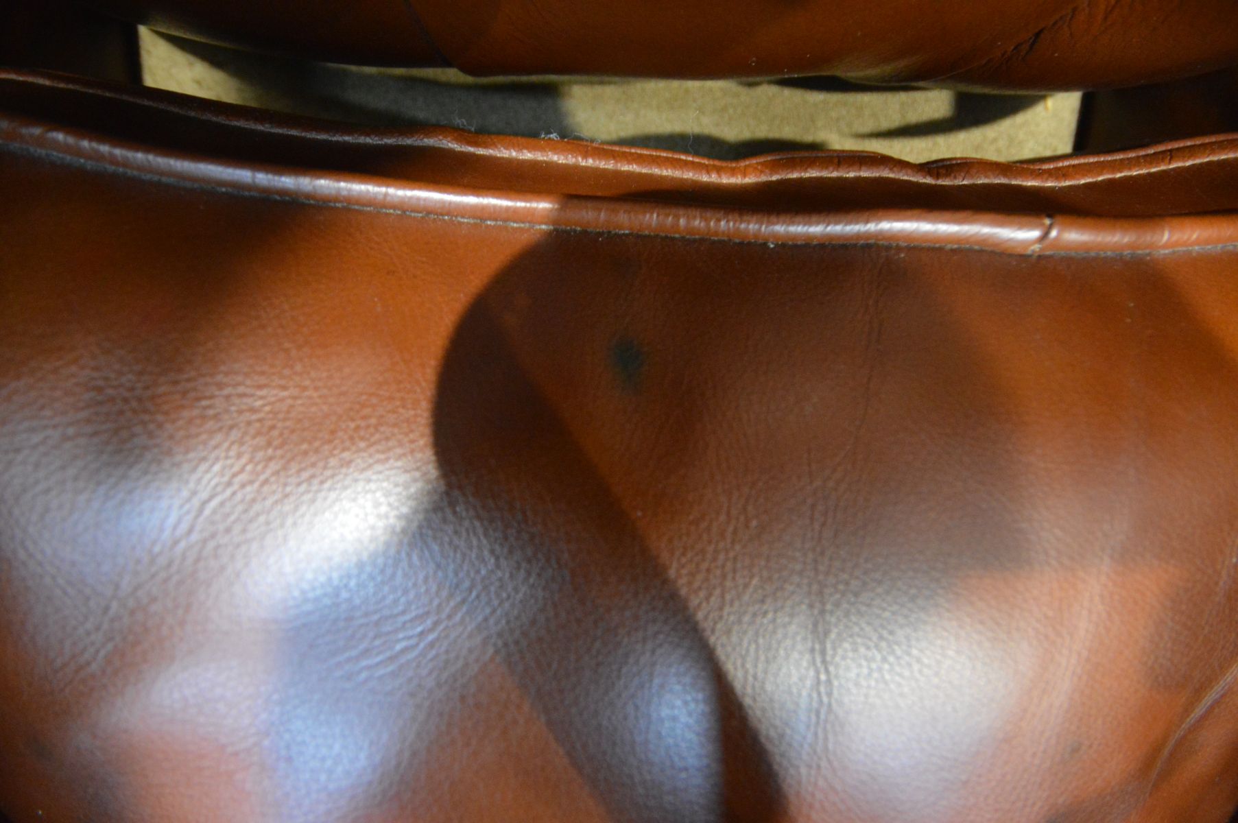 A BROWN LEATHER BUTTONED WING BACK ARMCHAIR, with flat outswept armrests, on cabriole front legs, - Image 3 of 3