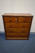 A VICTORIAN MAHOGANY CHEST OF TWO SHORT OVER THREE LONG DRAWERS, with turned handles, on flat bun