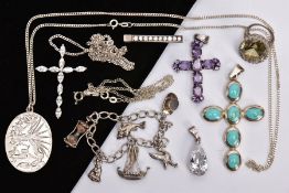 A SELECTION OF SILVER AND WHITE METAL JEWELLERY, to include a silver oval pendant, engraved with the