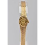 A LADIES 9CT GOLD ROTARY WRISTWATCH, hand wound movement, oval gold dial signed 'Rotary Twenty-One