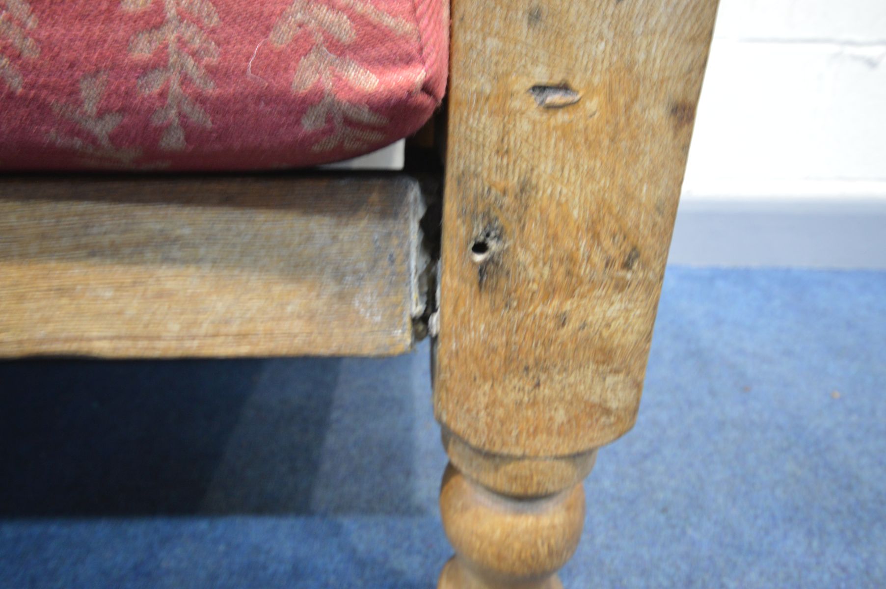 A 19TH CENTURY OAK HALL SETTLE, with panelled sides and back, and scrolled armrests, on turned front - Image 4 of 7