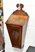 A GEORGE III STYLE MAHOGANY AND FIGURED MAHOGANY WALL HANGING CANDLE BOX, shaped back above sloped