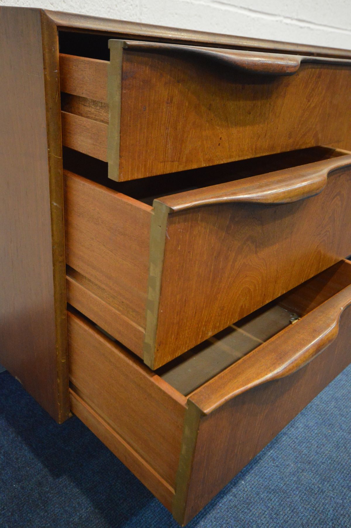 A MCINTOSH AND CO TEAK SIDEBOARD, with three drawers, the top drawer with cutlery dividers and baize - Image 5 of 6