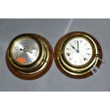 A WEMPE BRASS CASED SHIPS STYLE BAROMETER AND MATCHING WALL CLOCK, both with loose wooden wall