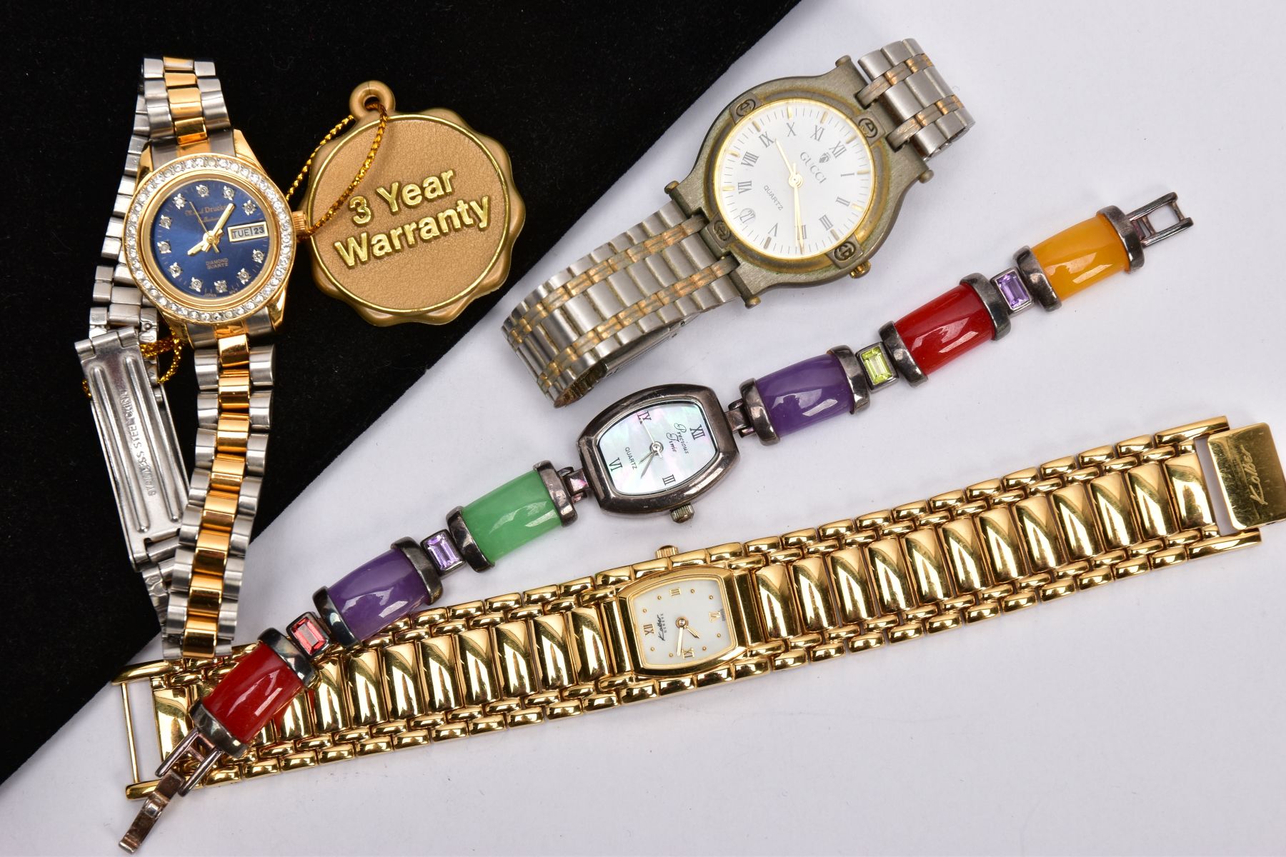 FOUR WATCHES, to include a lady's wristwatch with mother of pearl face and gem set strap, a Kolber